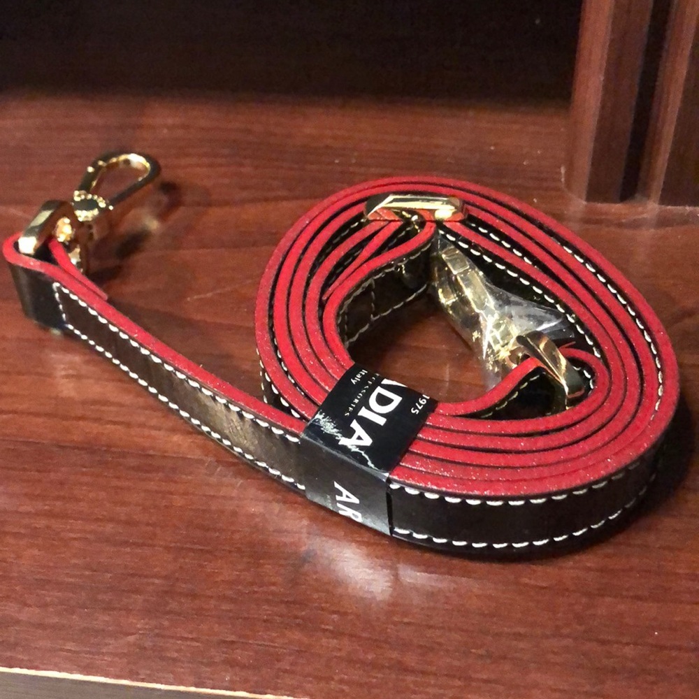 Black with red purse strap